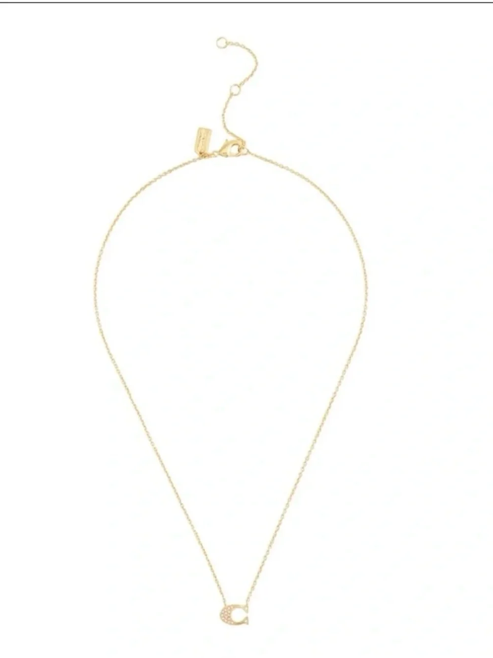 Coach gold tone